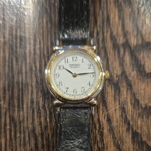 Seiko Gold Case with Black Strap Watch